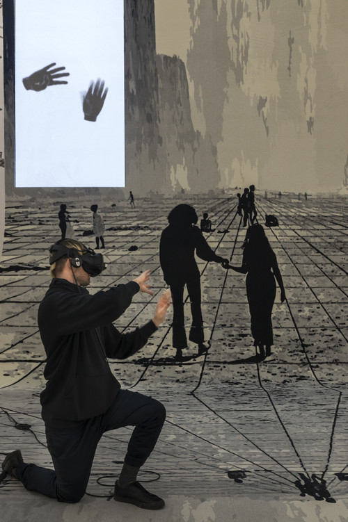 
     
     <i>Pre-Alpha Courtyard Games (raindrops on my cheek)</i>,      2017<br />
     VR-Installation, custom made VR Software build with Unity, VIVE VR Station, Leap Monitor Controller, custom made carpet, scaffold, plexiglass, projectors, clay, 
     <br />
     Installation view, Zeppelin Museum, Friedrichshafen, Germany, 2017 