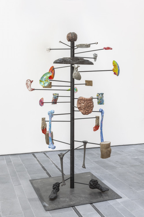 
     <i>Dig of No Body (Organ*isation)</i>, 
     2019<br />
     aluminium, crystal, cement, copper, coal, grass seeds, horn, iron, resin, pigment, plastic trash, sand, soil, steel, 
      185 x 60 x 50 cm<br />
     Installation view 16th Istanbul Biennial, Turkey, 2019