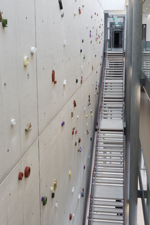 
     <i>Leaning Wall</i>, 
     2014<br />
     Imprints of female and male body parts cast in colour-glazed Meissen porcelain, 
      varous sizes<br />
     Permanent site specific installation at Robert Koch Institute, Berlin, Germany