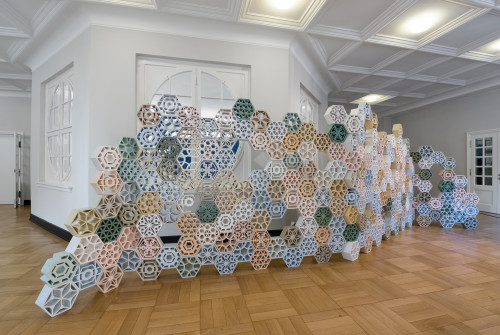 
     <i>Jali</i>, 
     2017<br />
     Glazed Ceramics, 
      220 x 650 x 14 cm<br />
     Installation view: documenta 14  Kassel, Germany and Athens, Greece