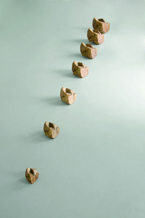 
     <i>wachsender Stein (growing stone)</i>, 
     2008/2012<br />
     quartzite, bronze, 
      dimensions variable<br />
     photo: H. Felix Gross