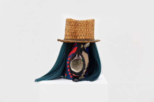 
     <i>Purse First</i>, 
     2019<br />
     Cedar top hat, Pendelton wool purse, Nike Air Max shoe, abalone shell, wig, metal, 
      36 x ø 23 cm<br />
     