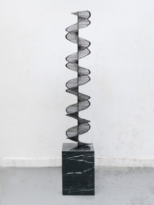 
     <i>Die Doppeltreppe</i>, 
     2017<br />
     cut records, fabric, metal, marble plinth, 
      192 x 31 x 31 cm<br />
     