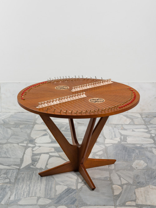 
     <i>Table Santouri (from the series Music Room, Athens)</i>, 
     2017<br />
     Wood, strings, Santouri mechanism, two ornamental plates in horn, 
      58.5 x Ø 77,5 cm<br />
     