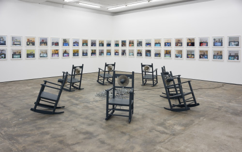 <i>Außer Atem (Breathless)</i>, 1989/95/96<br />7 hand made rocking chairs, fan, each chair 95 x 58 x 81 cm<br />